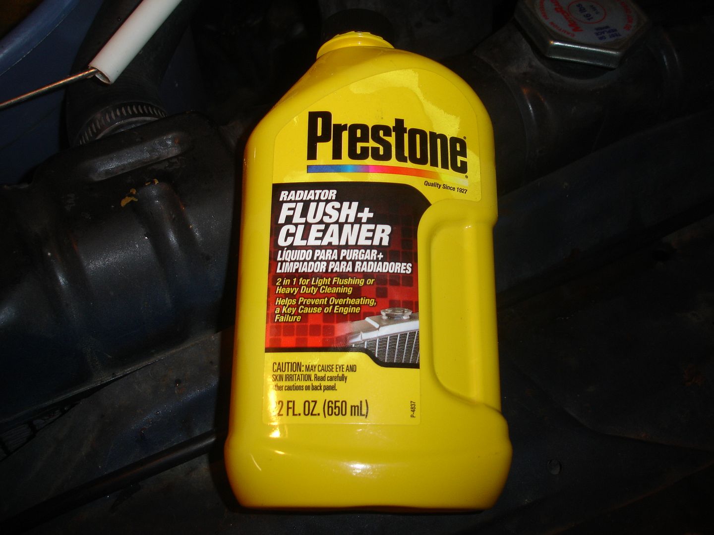 How to flush coolant from engine block with radiator off?